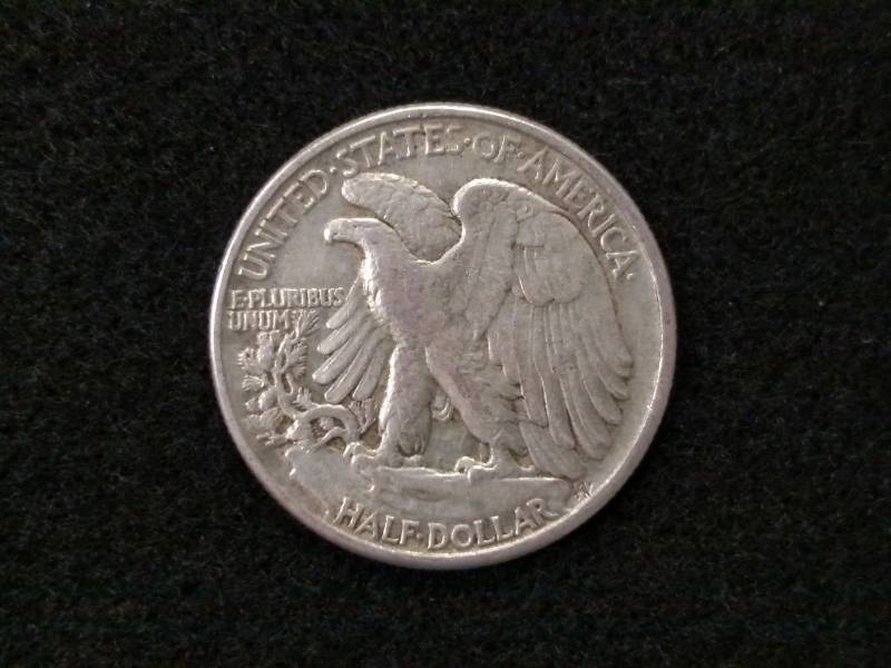 lot 60 image: 1945 Walking Liberty Silver Half Do...