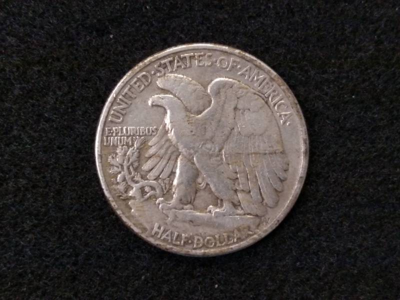 lot 63 image: 1946 Walking Liberty Silver Half Do...