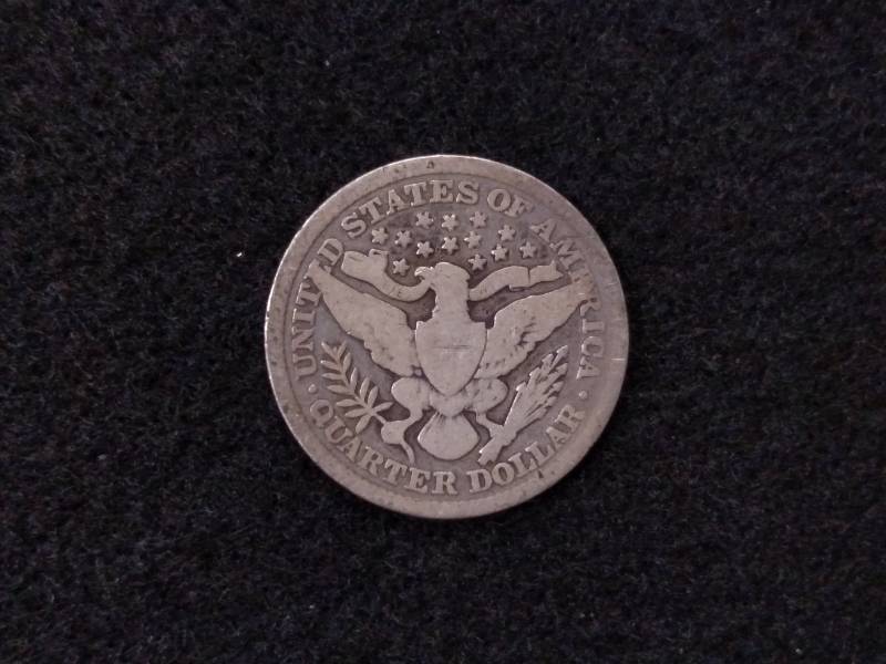 lot 87 image: 1897 Barber Silver Quarter...