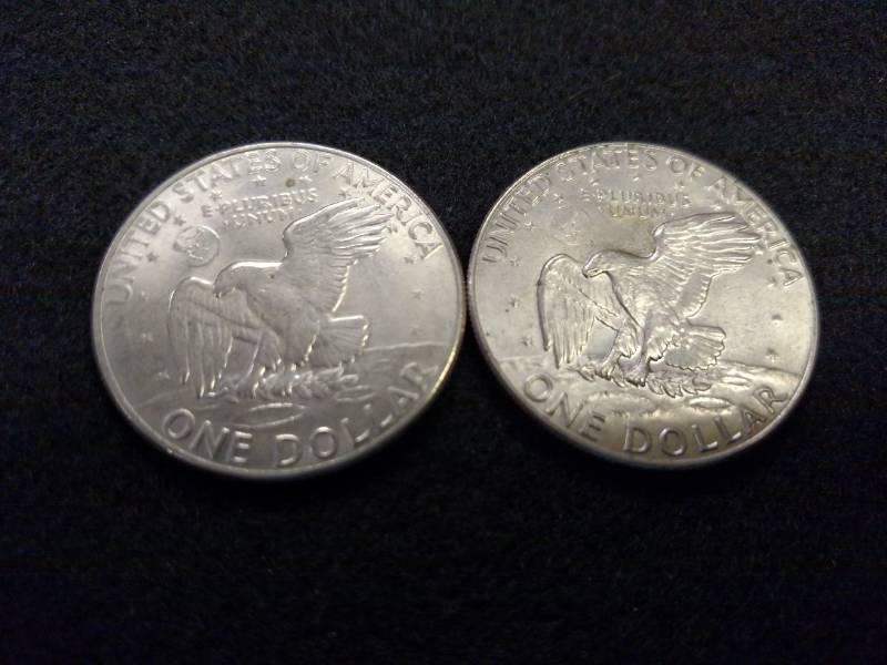 lot 100 image: 1972 D & 1974 D Eisenhower Dollars...