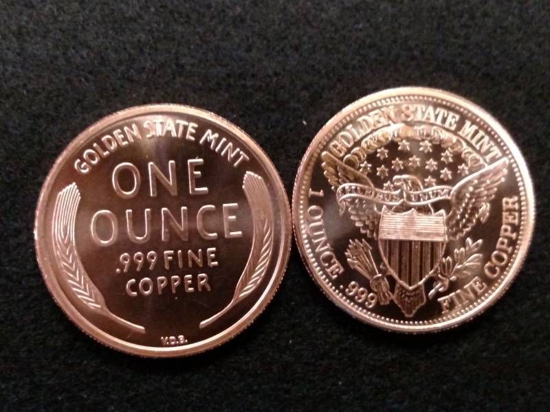 lot 104 image: (2) One Ounce Copper Coins...