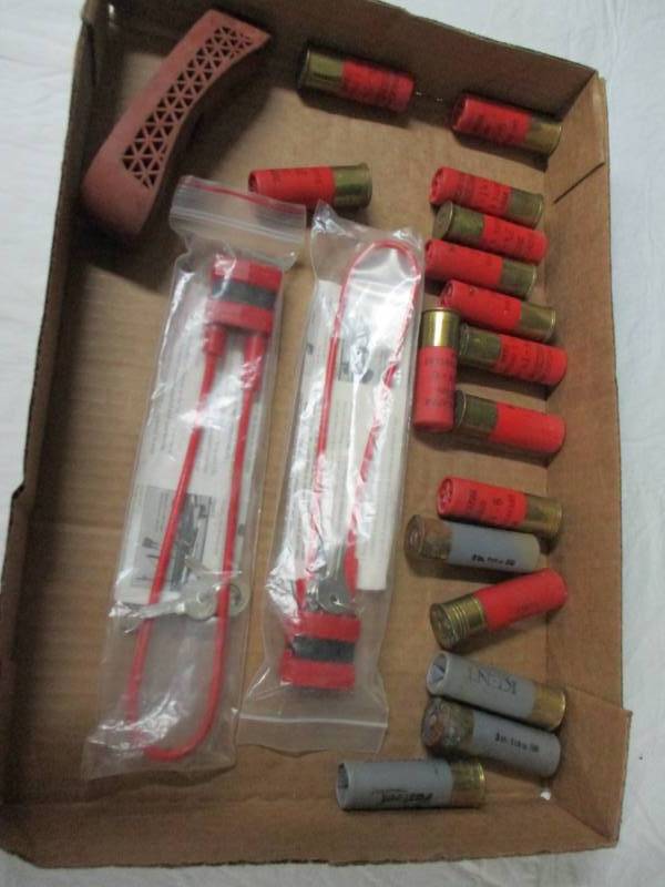 lot 47 image: 2 gun locks, misc 12 Ga shot gun shells and buitt to gun