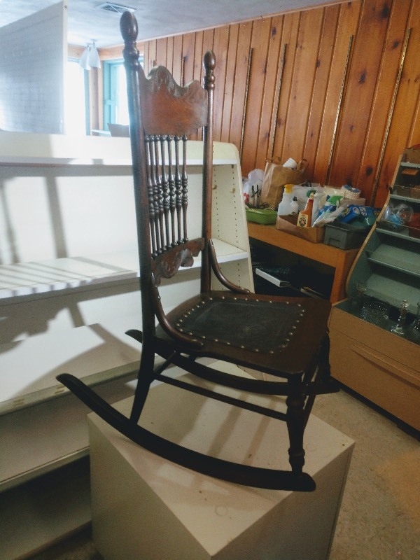 lot 54 image: Antique Wood Rocking Chair Spindle Backrest Black Tooled Leather Seat