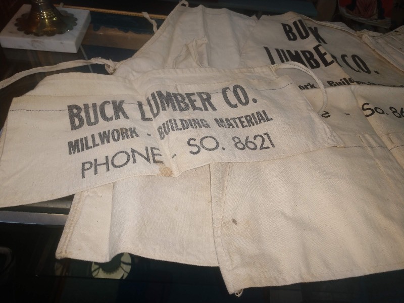 lot 80 image: Vintage Nail Apron Buck Lumber Co. ADVERTISING (2) - Vintage Nail Apron