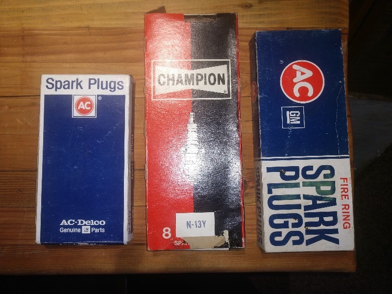 lot 114 image: NOS AC-Delco Genuine GM Spark Plugs - NOS AC-Delco GM Fire Ring Spark Plugs 45S - NOS Champion N-13Y Spark Plugs