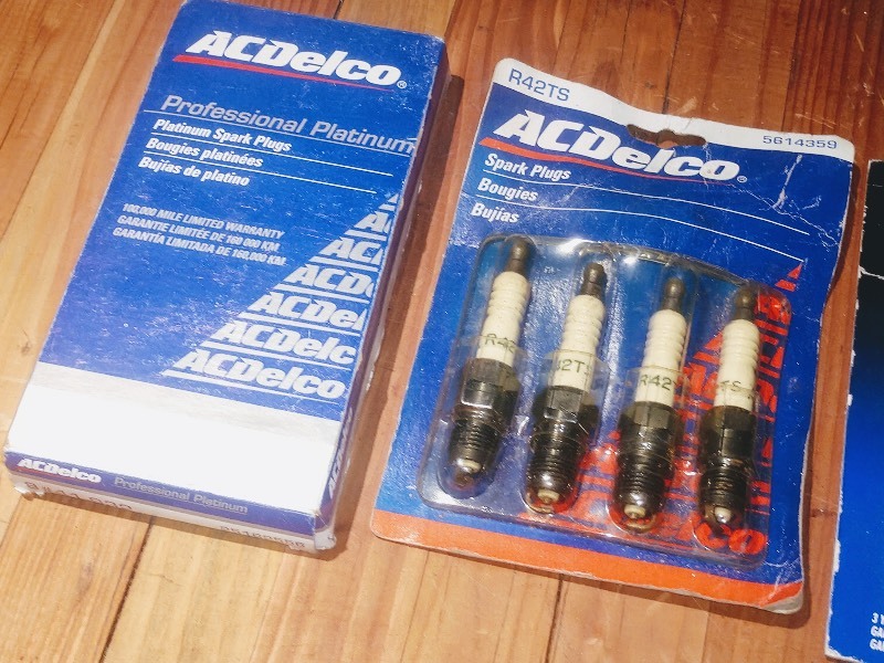 lot 116 image: NOS AC Delco Professional Platinum #41-932 Spark Plugs - NOS AC Delco R42TS Spark Plugs - NOS Champion Platinum Power 3015-2 Spark Plugs