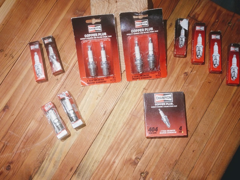 lot 119 image: NOS Champion Spark Plugs
