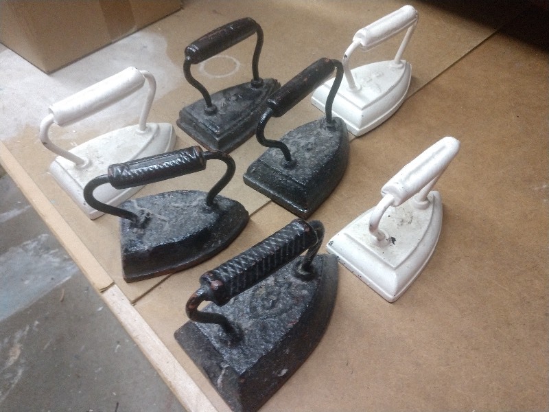 lot 103 image: Seven Antique Cast Iron Irons