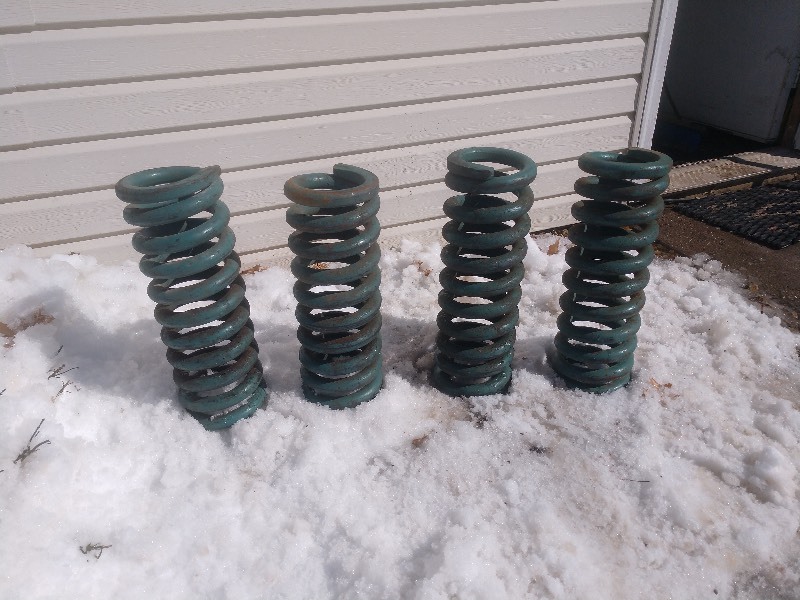 lot 85 image: Four Vintage Blue Industrial Heavy Duty Springs