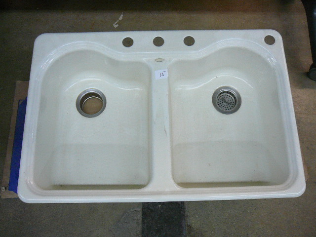 lot 15 image: Cast Iron Kitchen Sink
