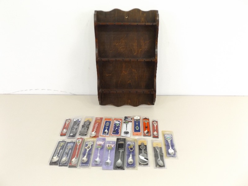 lot 39 image: Lot of 21 NEW Souvenir Spoons and Wood Display Rack