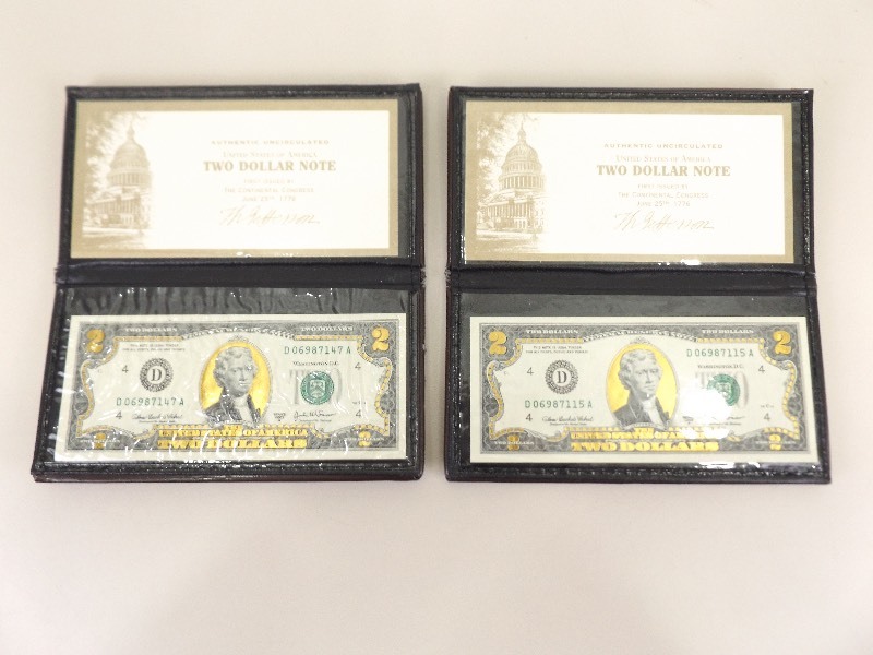 lot 14 image: 2 Uncirculated US $2 Bills in Cases with COAs