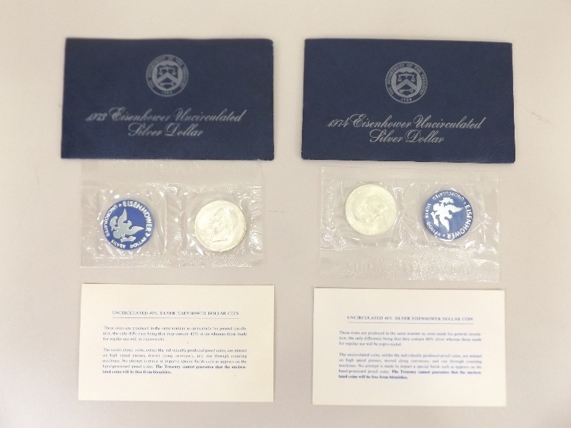 lot 17 image: 1973 and 1974 Uncirculated Eisenhower Silver Dollars