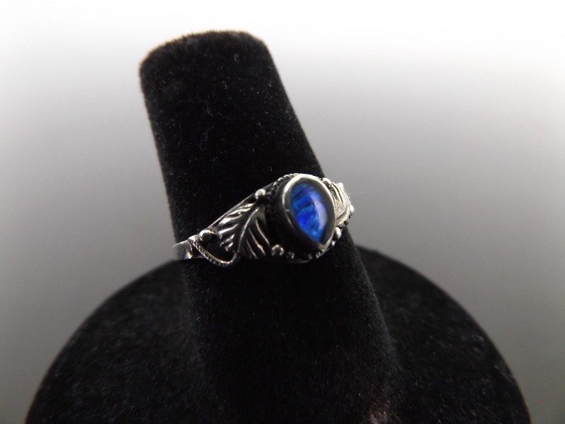 lot 87 image: .925 Sterling Silver Iridescent Blue Ring Size 6