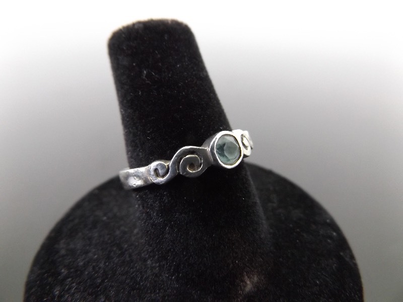 lot 92 image: .925 Sterling Silver Faceted Blue Topaz Ring Size 6.5