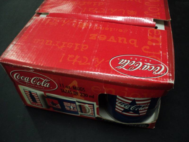 lot 107 image: 4 -11 oz Coca Cola Mugs...
