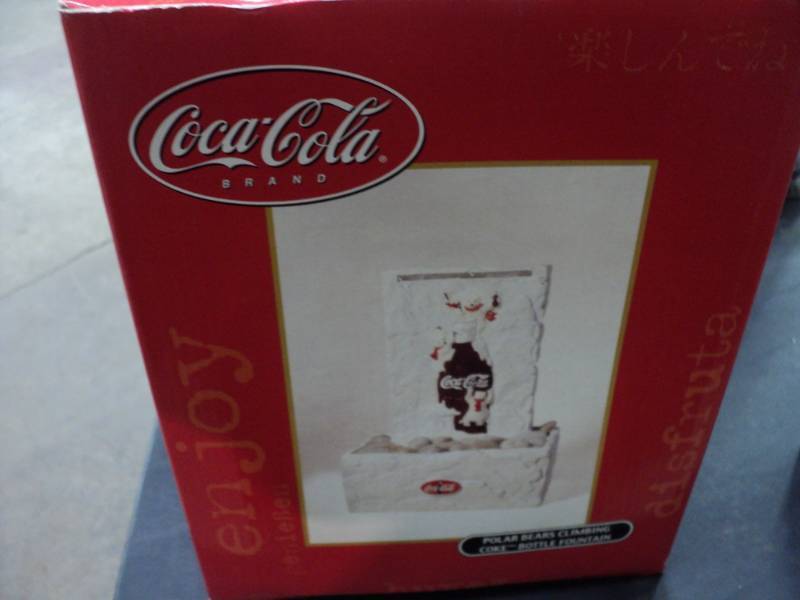 lot 110 image: Coca Cola Polar Bears Climbing Coke...