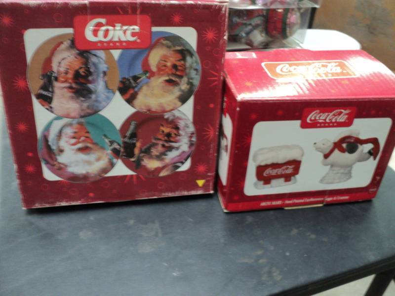 lot 111 image: Coca Cola set of 4 desert Santa Pla...