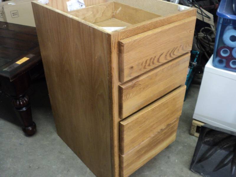 lot 124 image: Wood 4 Drawer Cabinet needs top a...