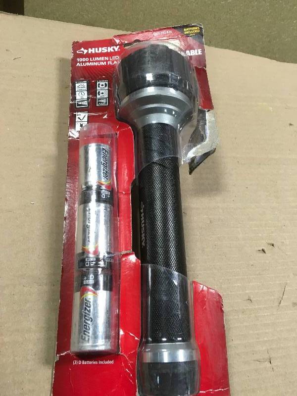 lot 17 image: Husky 1000 Lumen Virtually Unbreakable Aluminum Flashlight not used