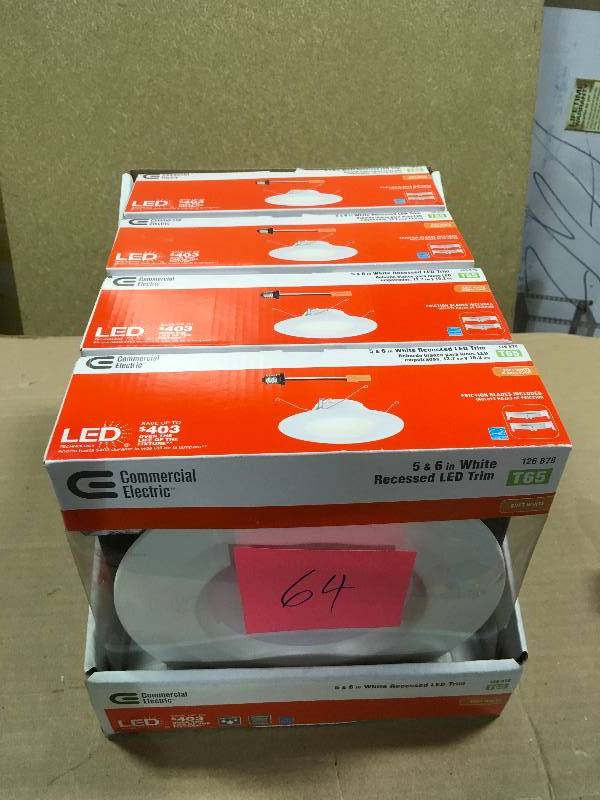 lot 64 image: Commercial Electric 5 in. and 6 in. White Integrated LED Recessed Trim QTY 4 in like new condition