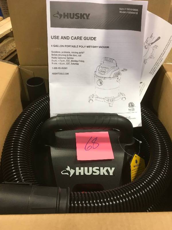 lot 68 image: Husky 4 Gal. Portable Poly WetDry Vacuum in like new condition