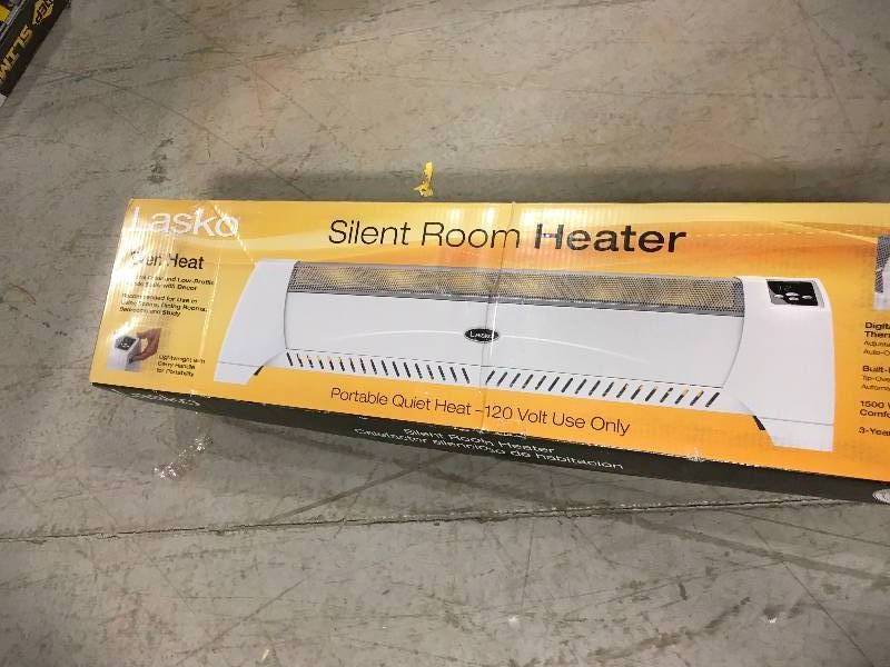 lot 73 image: Lasko 1,500-Watt Low Profile Silent Room Heater with Digital Display, White in like new condition