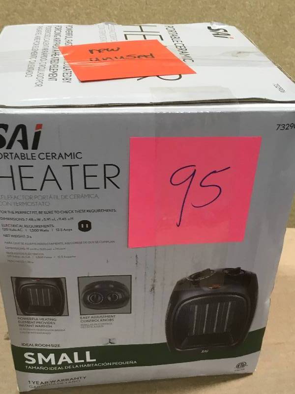 lot 95 image: 1,500-Watt Convection Electric Portable Heater and Fan in like new condition