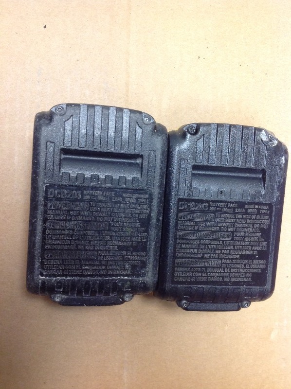 lot 107 image: DEWALT 20V MAX Battery, Compact 2.0Ah Double Pack in working conditions