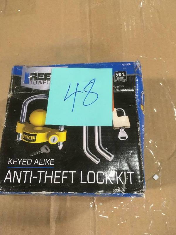 lot 48 image: Reese Towpower Towing Anti-Theft Lock Kit in like new condition