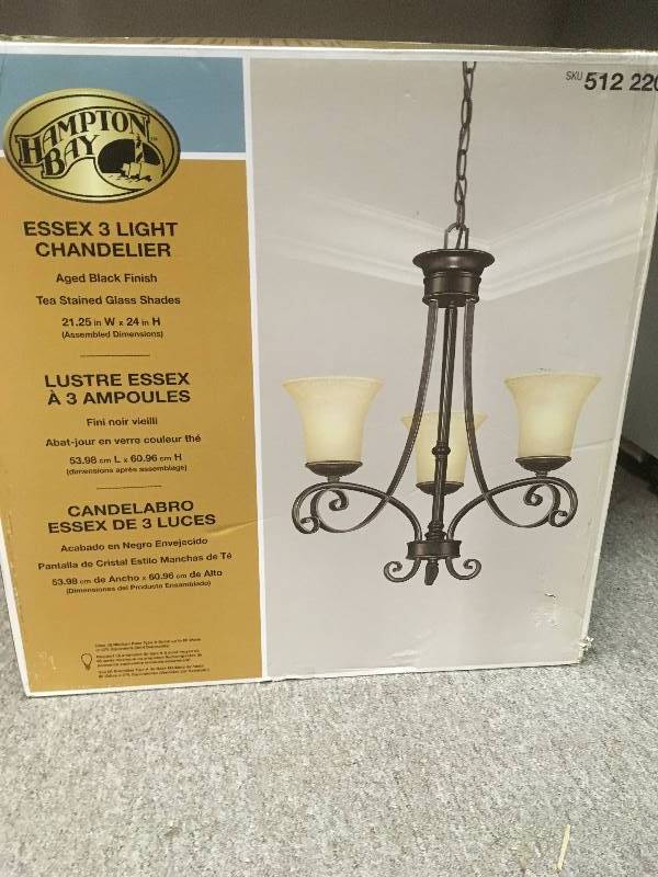 lot 83 image: Hampton Bay Essex 3-Light Aged Black Chandelier with Tea Stained Glass Shades