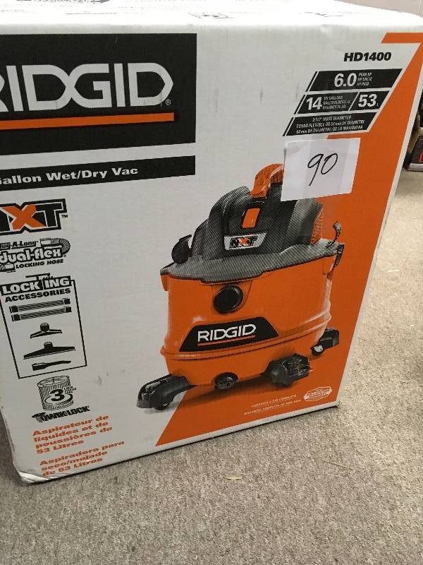 lot 90 image: RIDGID 14 Gal. 6.0-Peak HP NXT Wet Dry Vacuum in good condition