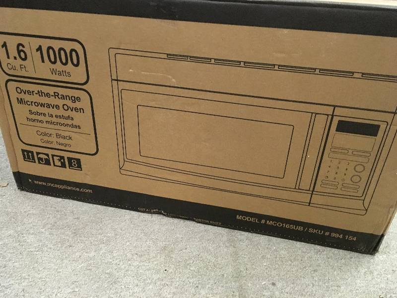 lot 94 image: Magic Chef 1.6 cu. ft. Over the Range Microwave in Black in like new condition
