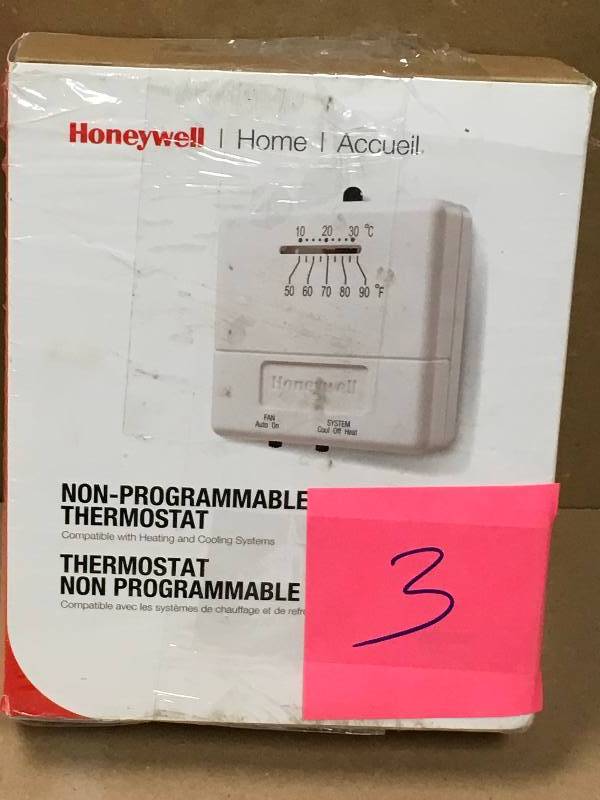 lot 3 image: Economy HeatCool Manual Thermostat in like new condition