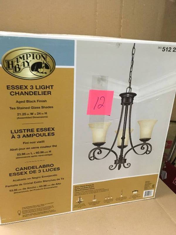 lot 12 image: Hampton Bay Essex 3-Light Aged Black Chandelier with Tea Stained Glass Shades in like new condition