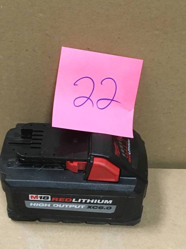 lot 22 image: Milwaukee M18 18-Volt Lithium-Ion XC 6.0 Ah Extended Capacity Battery Pack in good condition