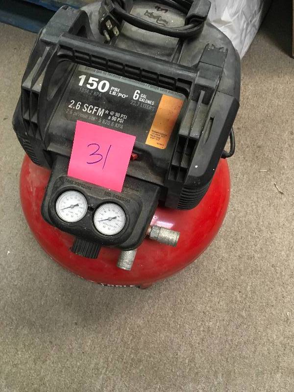 lot 31 image: Porter-Cable 6 Gal. 150 PSI Portable Electric Pancake Air Compressor in good condition