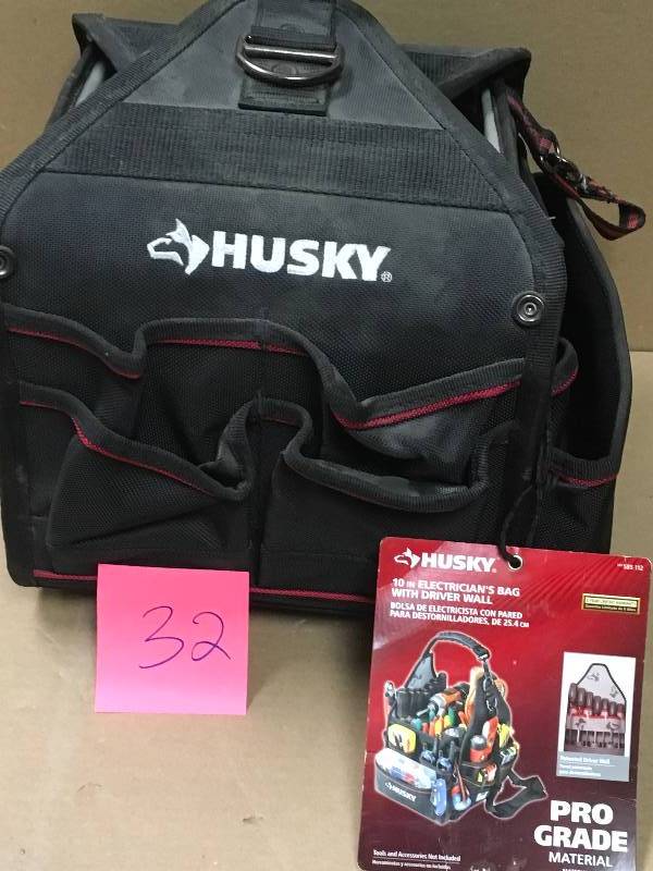 lot 32 image: Husky10 in. Electrician Tool Bag with Driver Wall in like new condition