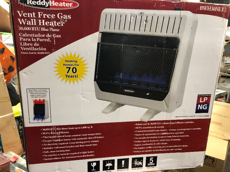 lot 117 image: Reddy Heater  30,000 BTU Blue Flame Dual-Fuel Wall Heater with Blower in working conditions
