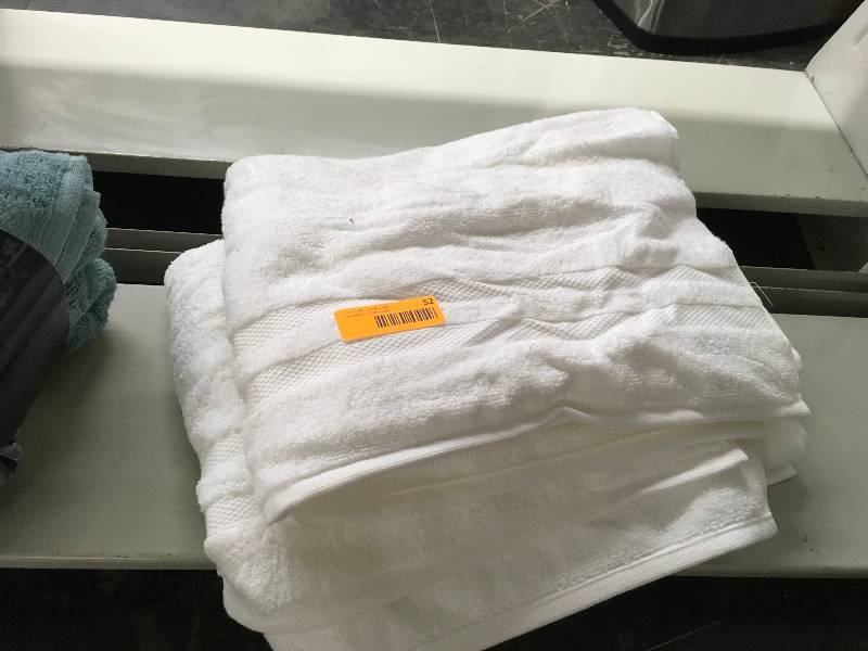 lot 52 image: 2PK Charisma Bath Towels, Retail $9.99