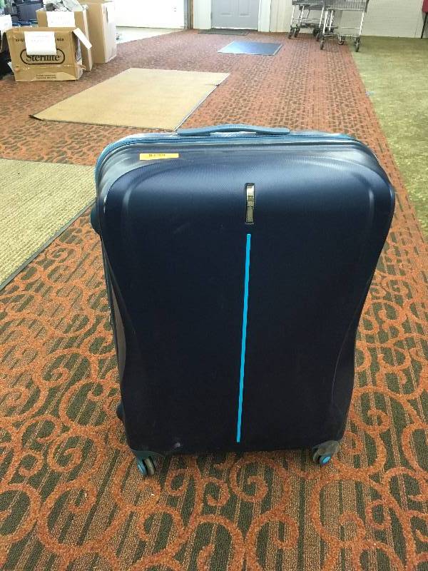 lot 105 image: American Tourister Luggage, Retail $79.99