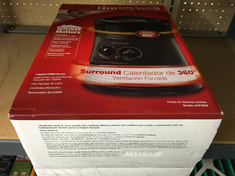 lot 124 image: Honeywell 360 Surround Heater, Retail $49.99