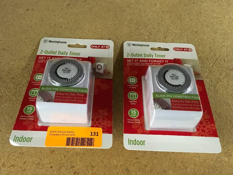 lot 131 image: Two Westinghouse 2 Outlet, Indoor Mechanical Timer, Retail $9.99