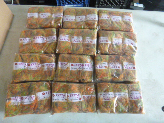 lot 95 image: 12 Packages of Red Heart Kiss Yarn