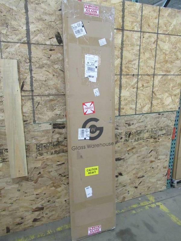 lot 284 image: Glass Warehouse 13 X 78 Custom Clear Glass Panel with Routed Hinge Mounts. No Hardware
