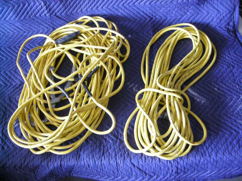 lot 4 image: 2 Heavy Duty Yellow Extension Cords