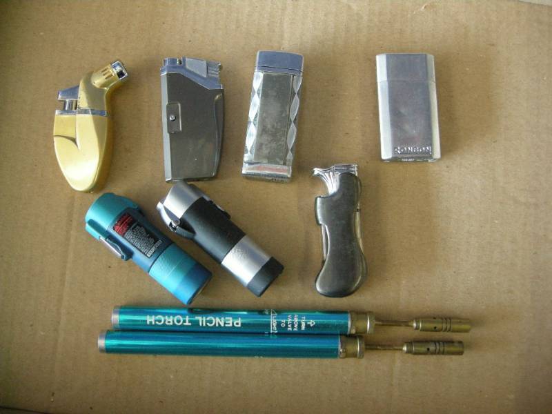 lot 30 image: Group Lighters, Torches