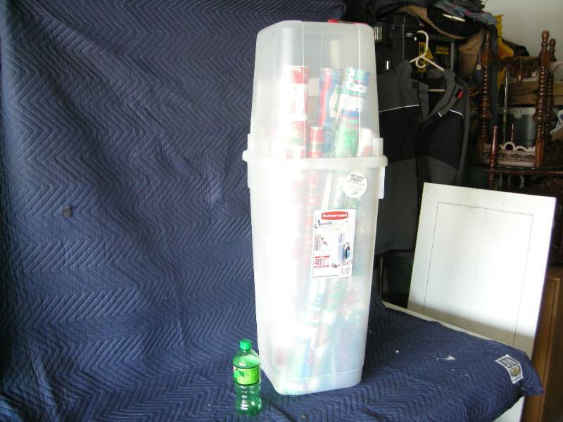 lot 59 image: Rubbermaid Gift Wrap Container with Contents