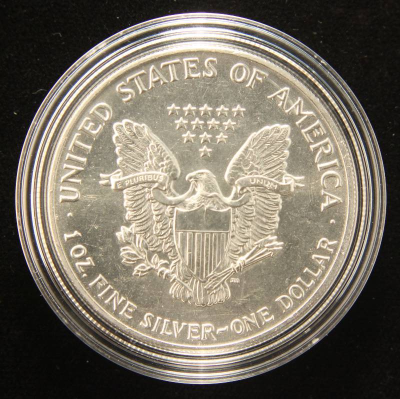 lot 43 image: 1991 AMERICAN SILVER EAGLE 1 TROY OZ. .999 FINE SILVER IN AIRTITE