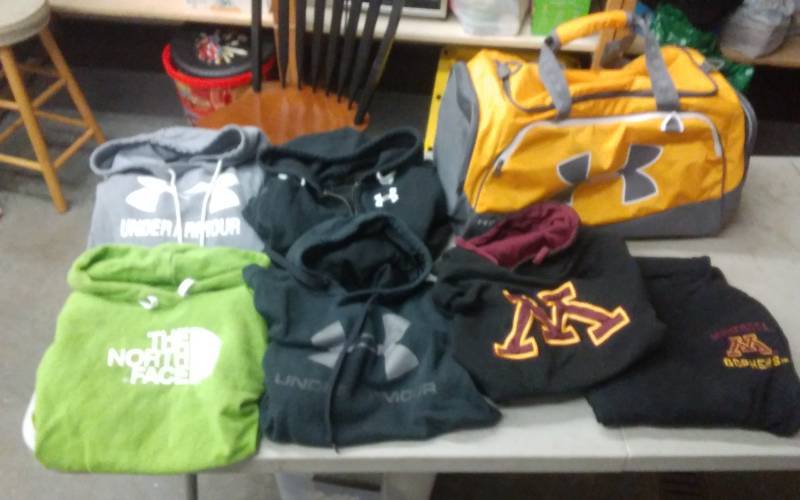 lot 39 image: Under Armour Duffel Bag, Sweatshirts & Hoodies (Most Size Medium Or Fit As So)